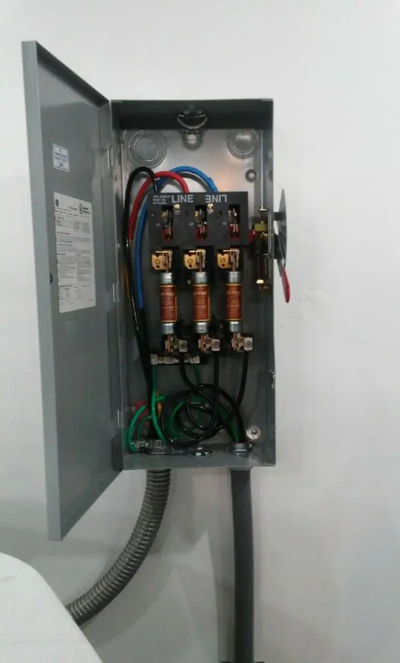 Three-phase disconnect switch installed for Smoke Detector Installation in Burton